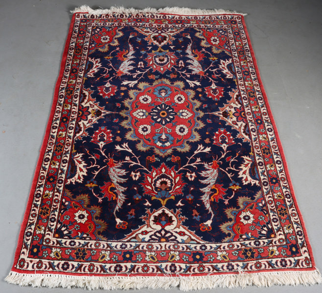 Håndknyttet Persisk teppe.