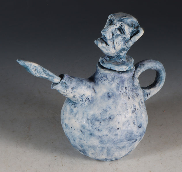 Kanne i keramikk m/mannshode.