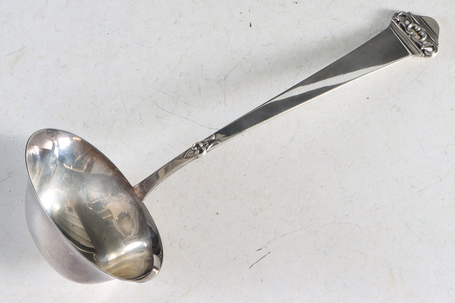 Stor øse i sølv, Saga.