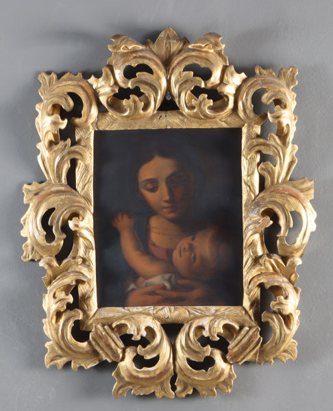 Rikt utskåret ramme i tre m/bilde. 1800 t.