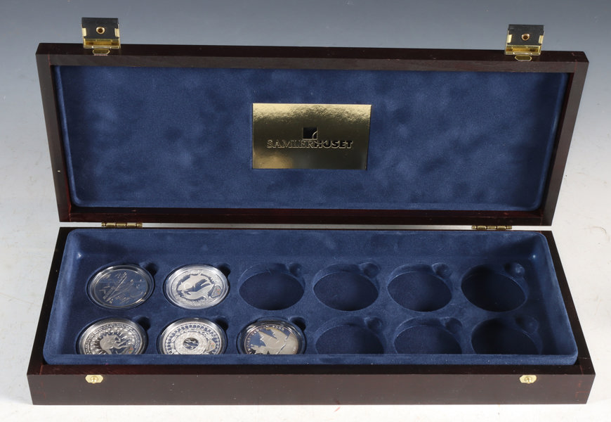 Skrin med 5 OL mynter i sølv.