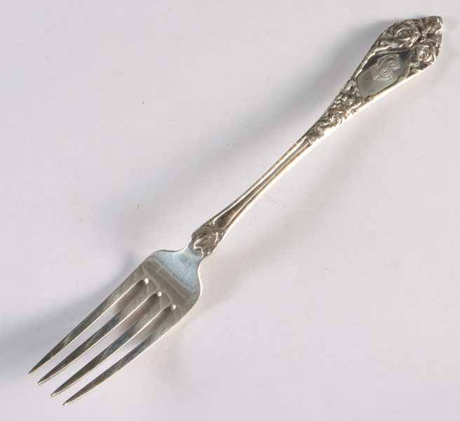 8 gafler i sølv, Opphøyet rose.