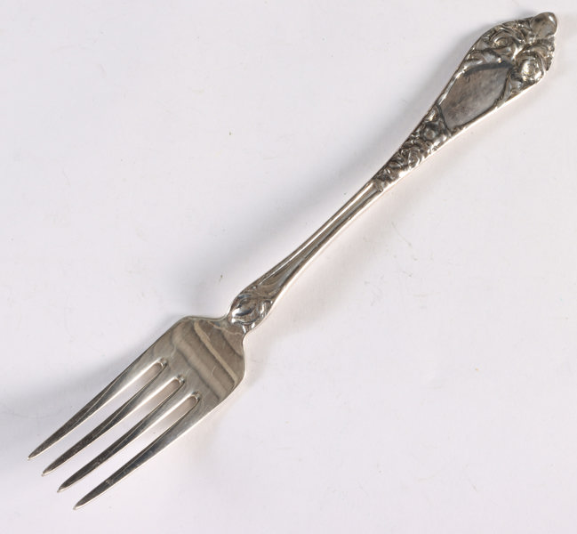 5 gafler i sølv, Opphøyet rose.