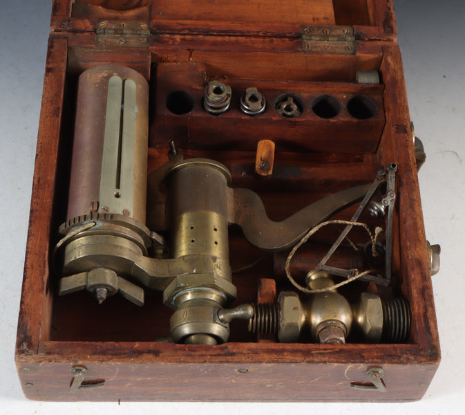 Måleapparat for trykk i eske.