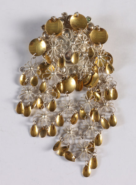 Sølje i sølv med lauv.