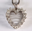 Kjede i hvitt gull med 18 diamanter, hjerte.