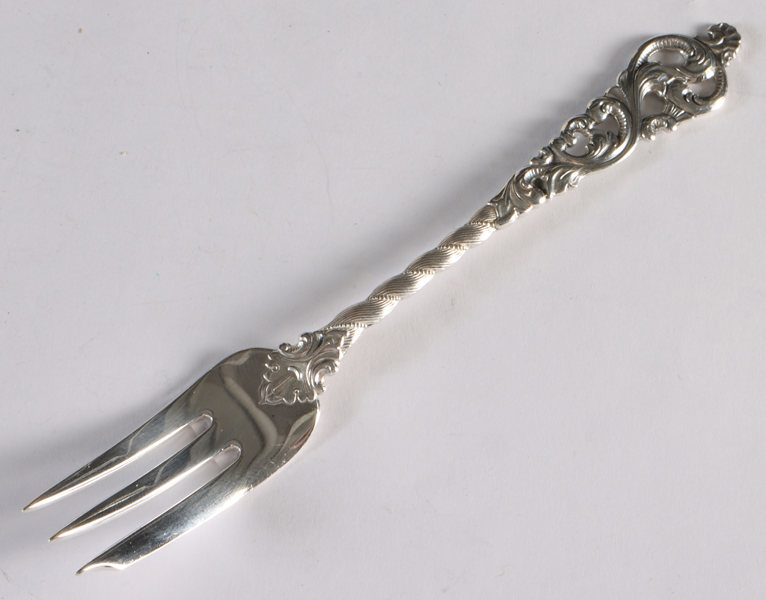 12 kakegafler i sølv, Dobbel Rokokko.