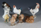 8 fuglefigurer i porselen.