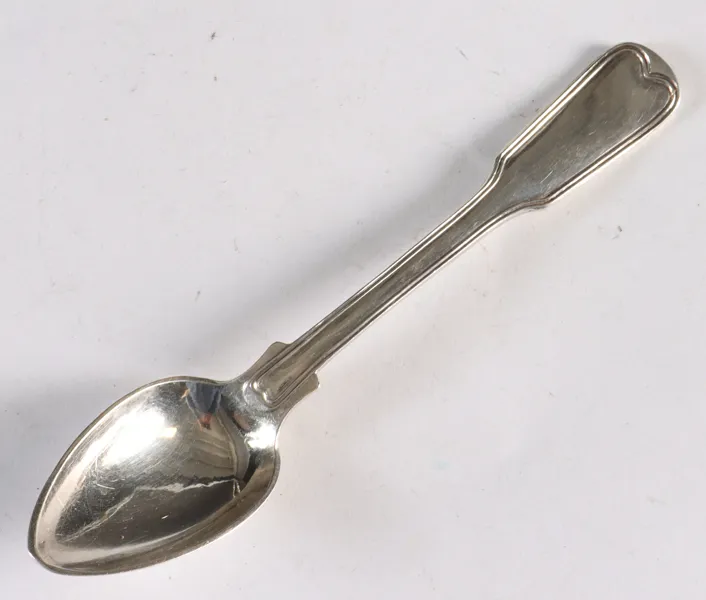 10 teskjeer i sølv. Thune 1859.