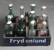 Flaskestativ med flasker, Frydelund.