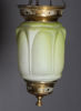 Måneskinnslampe i grønt glass.