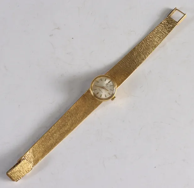 Armbåndsur i gull, Omega Ladymatic.