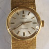 Armbåndsur i gull, Omega Ladymatic.